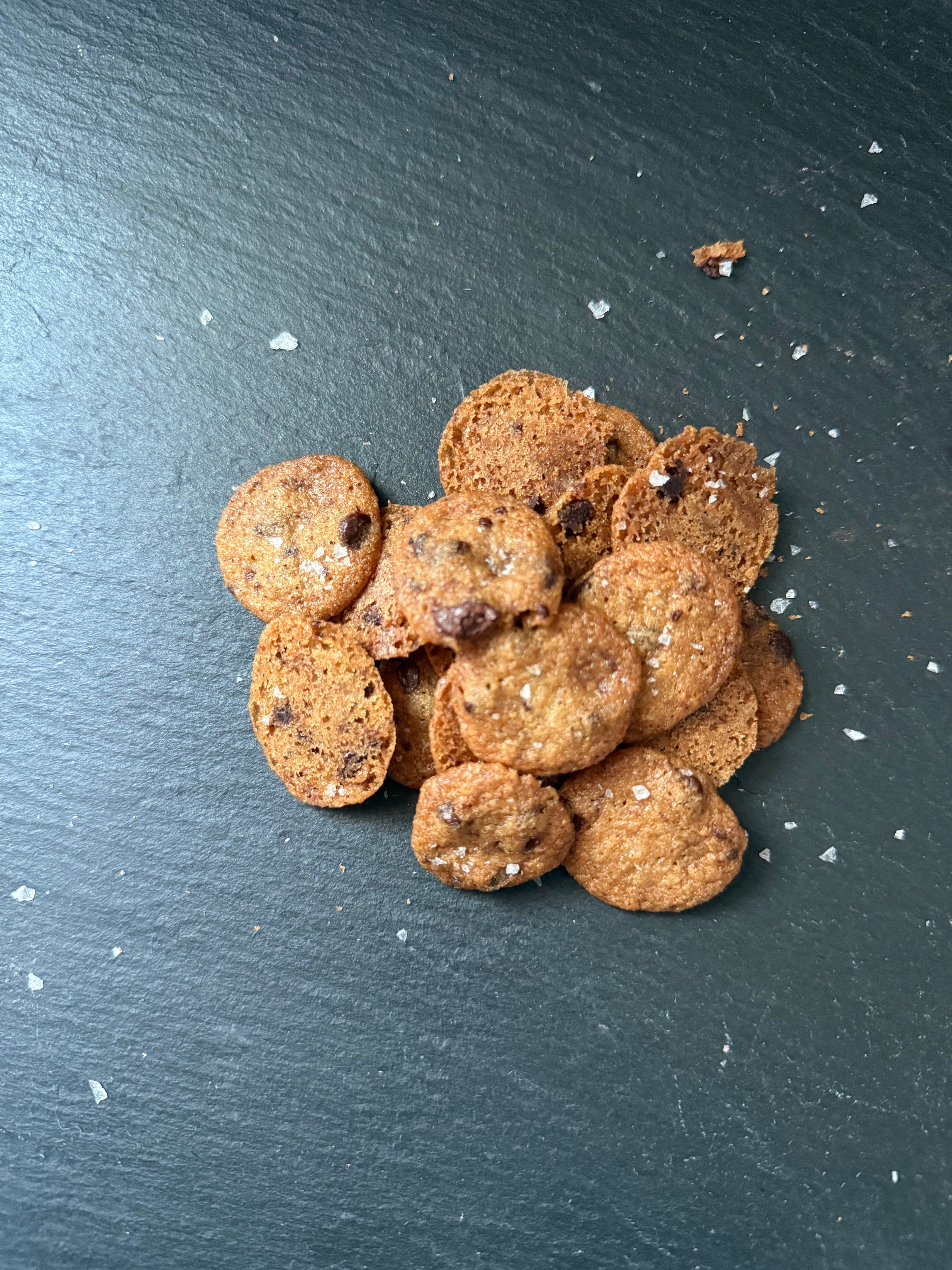Close-up of Salted Chocolate Chip Cooks showing chocolate chips and sea salt finish